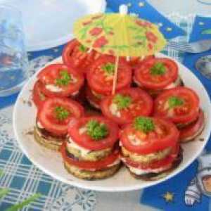 Пржени тиквички со лук и домати